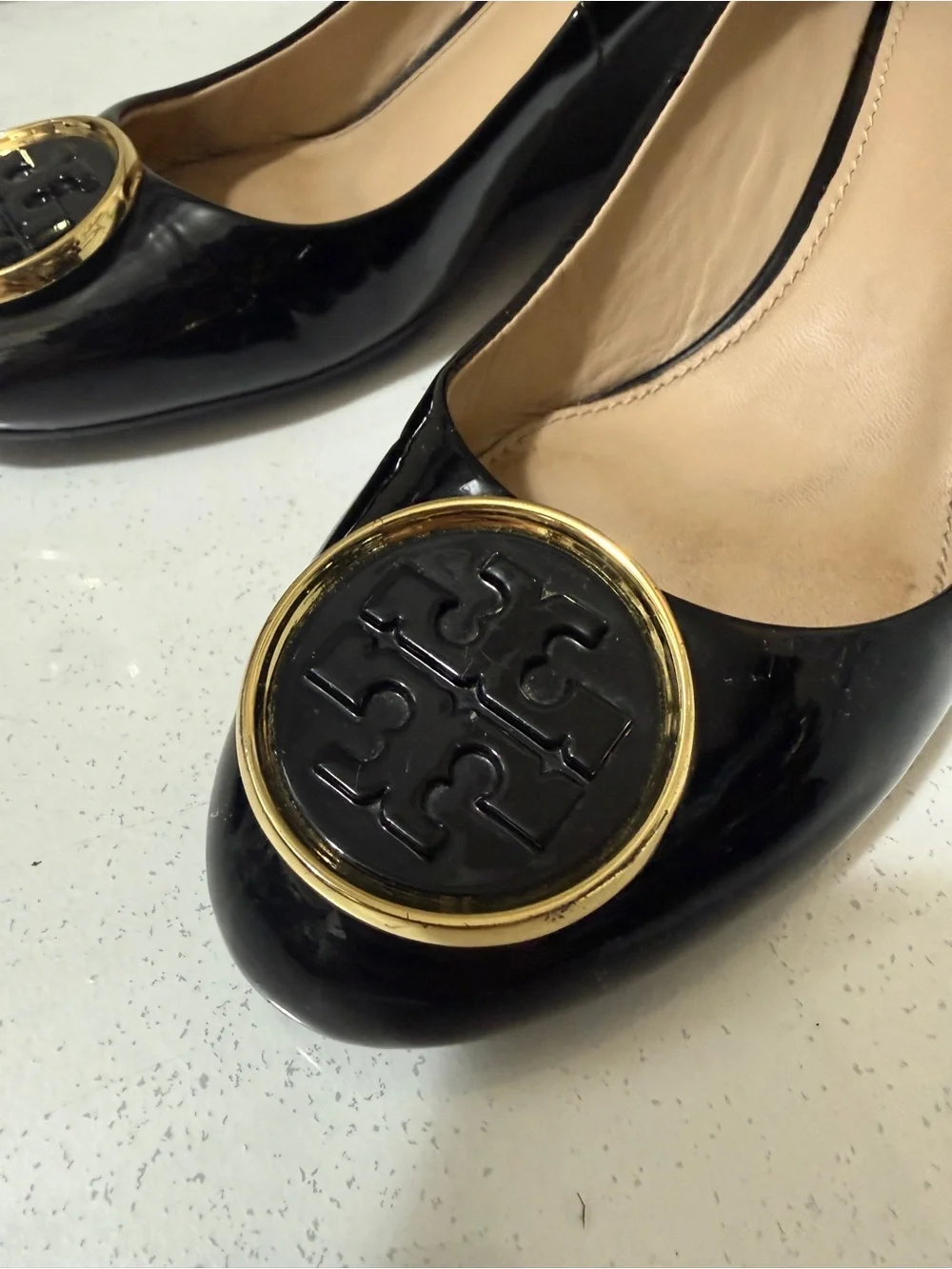 Tory Burch Black Patent Leather Wedge Flats with Gold Logo Medallions